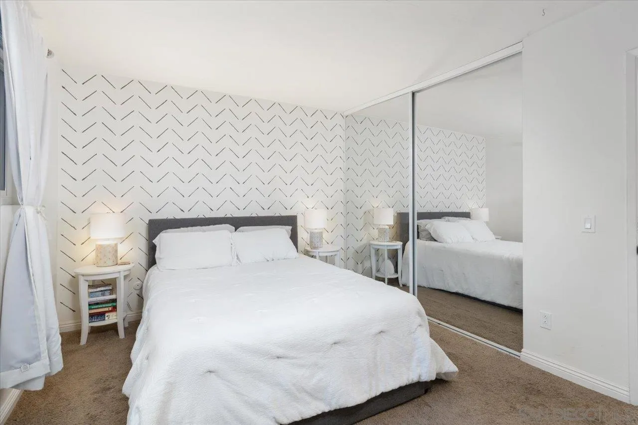 13433 Utopia Road Poway, CA 92064 - Photo 16 of 23 a bedroom with a bed and a couch
