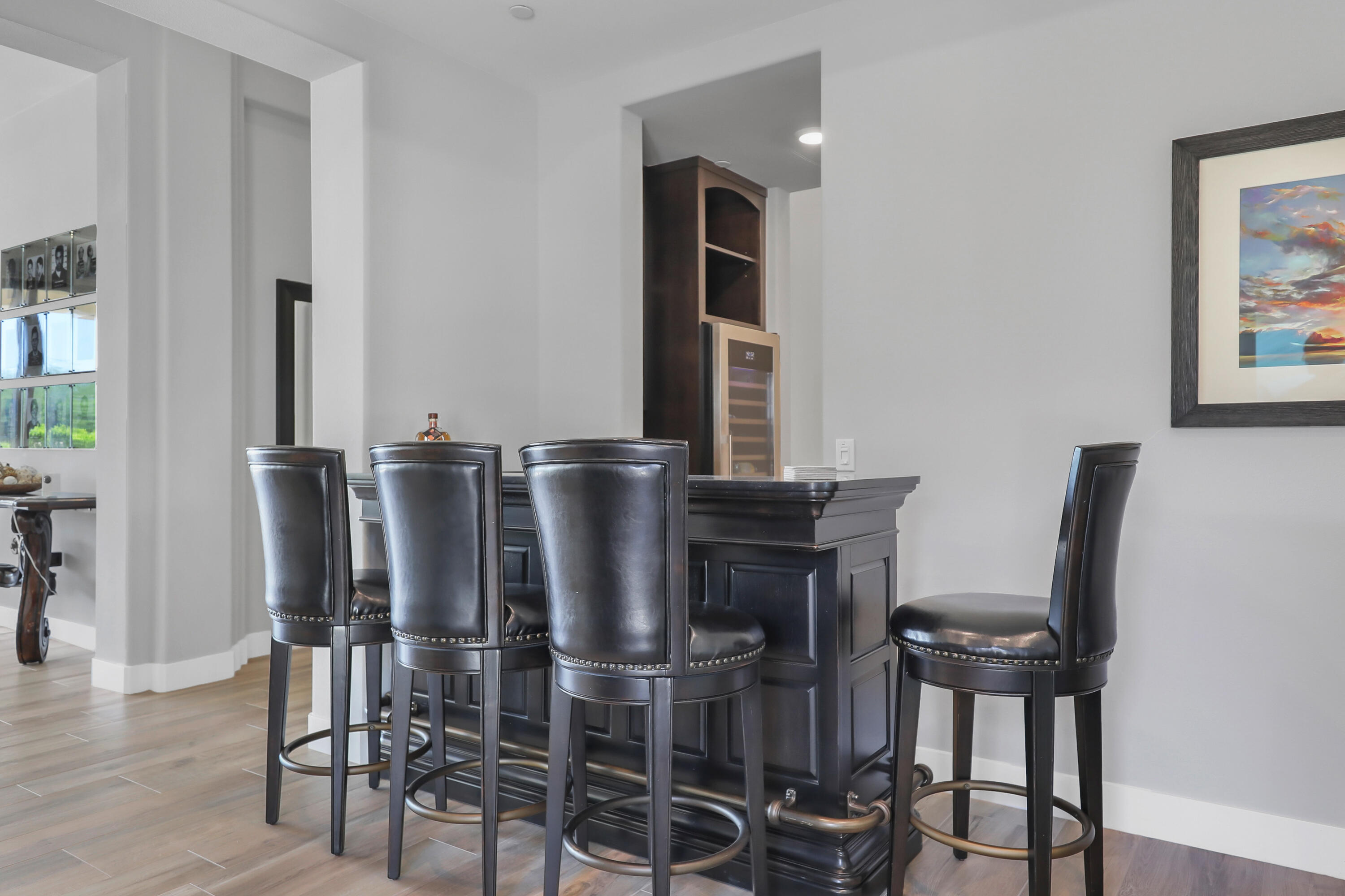 81-675 Thunder Gulch Way La Quinta, CA 92253 - Photo 12 of 61 a view of a dining room with furniture and wooden floor