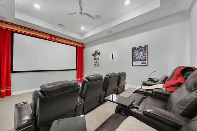 a bathroom with a granite countertop sink a toilet and a mirror