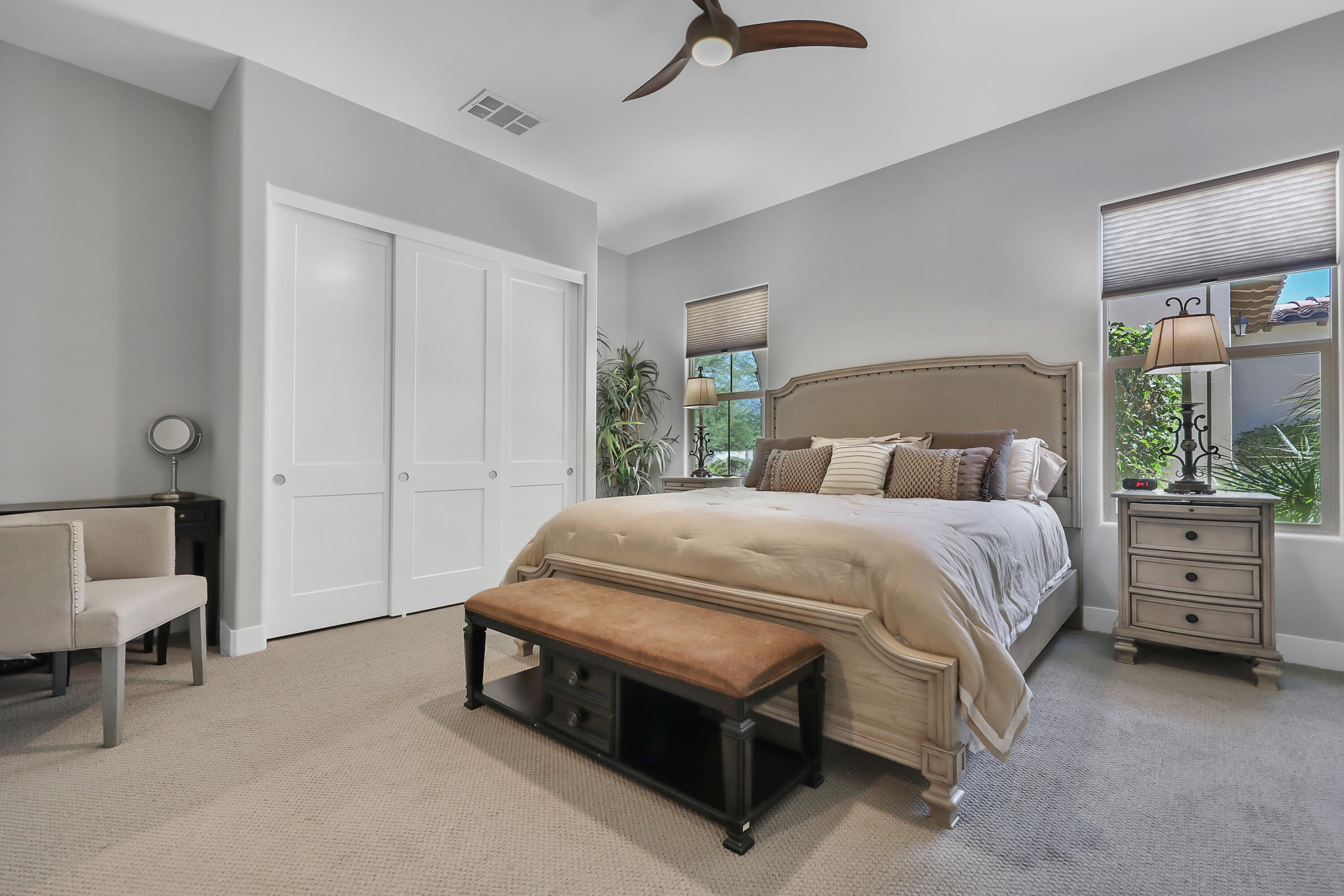 81-675 Thunder Gulch Way La Quinta, CA 92253 - Photo 31 of 61 a bed room with a bed and a chair