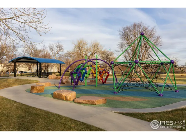 a house with swimming pool in front of it