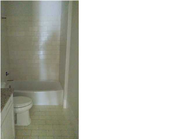X South 4th Street Santa Rosa Beach, FL 32459 - Photo 3 of 7 a bathroom with a toilet and a shower