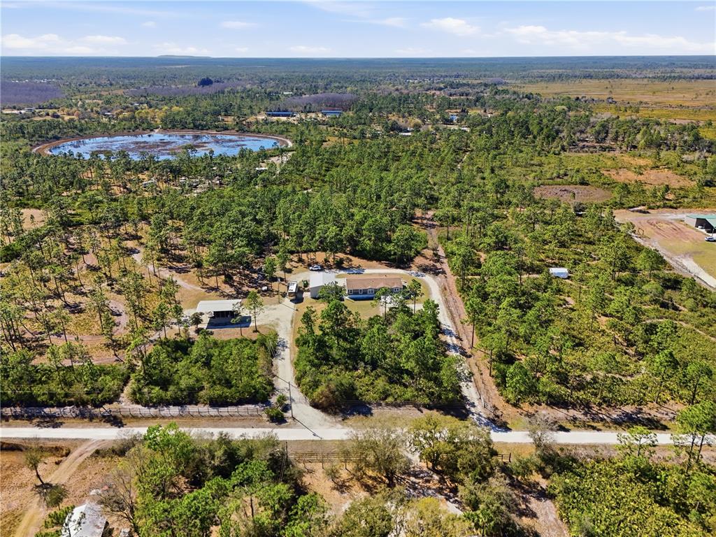 6844 Chad Jason Road St. Cloud, FL 34773 - Photo 53 of 59 an aerial view of multiple house
