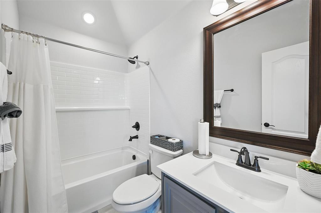 625 Ridgewater Trail Fort Worth, TX 76131 - Photo 16 of 27 Full bathroom with shower / bath combo, vanity, and toilet