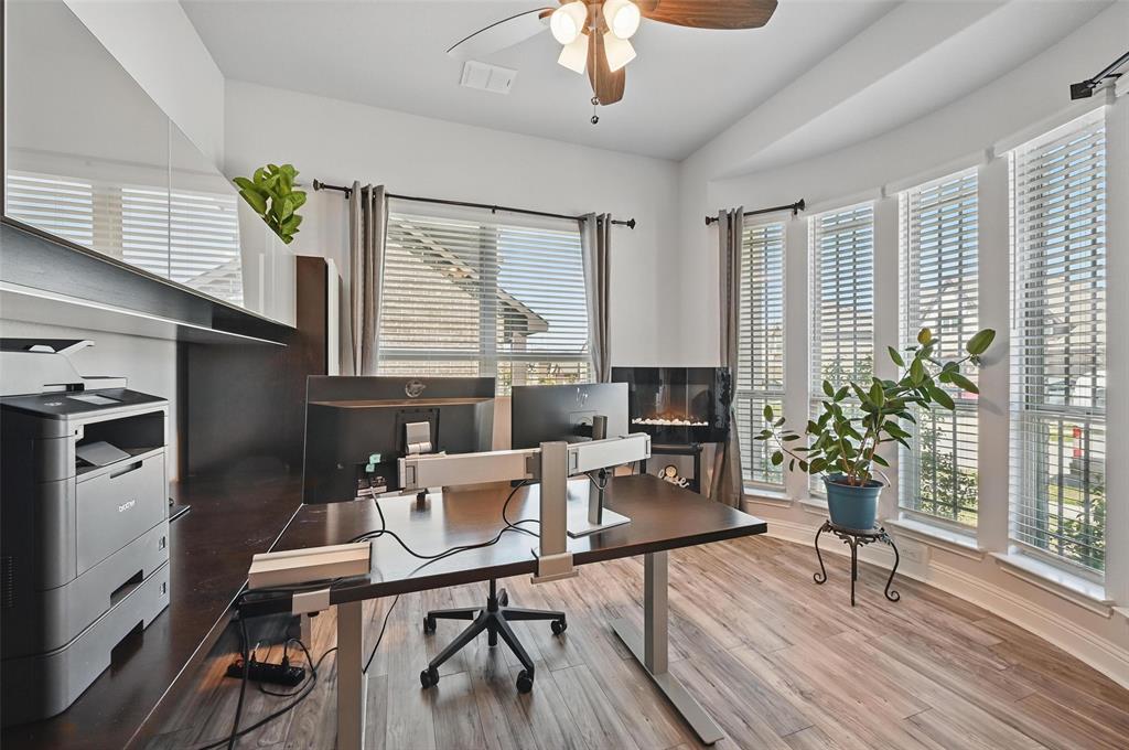 625 Ridgewater Trail Fort Worth, TX 76131 - Photo 22 of 27 Office space with lofted ceiling, visible vents, ceiling fan, and wood finished floors