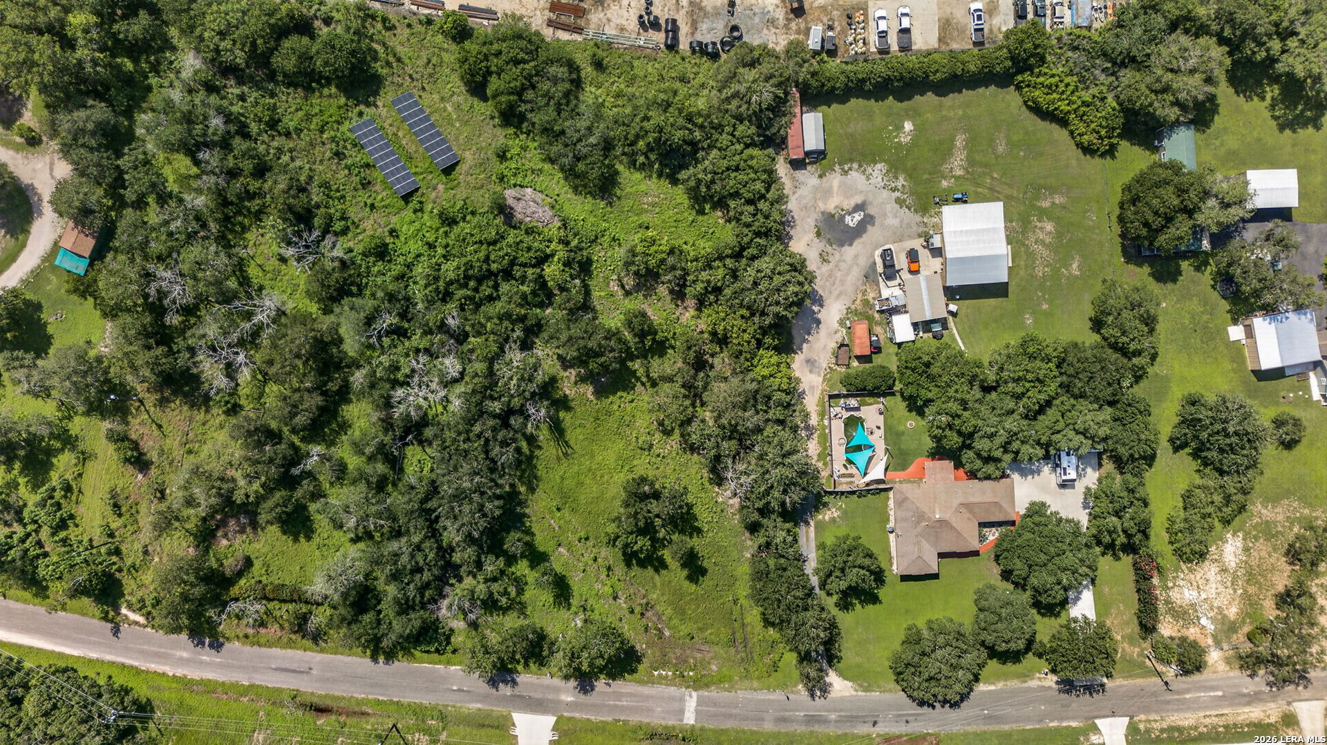 113 Buffalo Gap Seguin, TX 78155 - Photo 17 of 26 an aerial view of a house with a yard and lake view