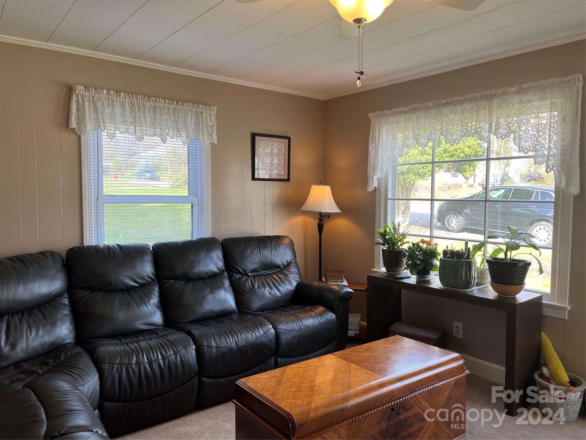 108 North Street Morganton, NC 28655 - Photo 3 of 12 a living room with furniture and a window