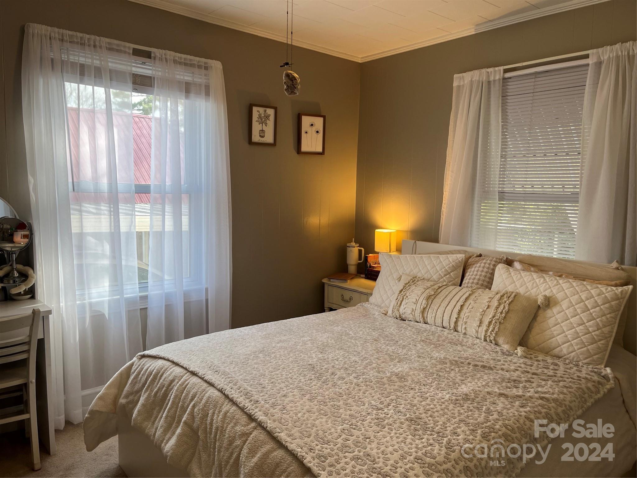 108 North Street Morganton, NC 28655 - Photo 6 of 12 a bedroom with a bed and a window