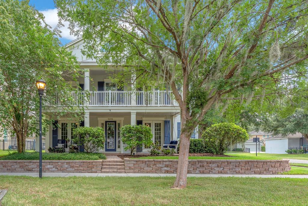 5310 Fishhawk Ridge Drive Lithia, FL 33547 - Photo 2 of 52 a front view of a house with a yard