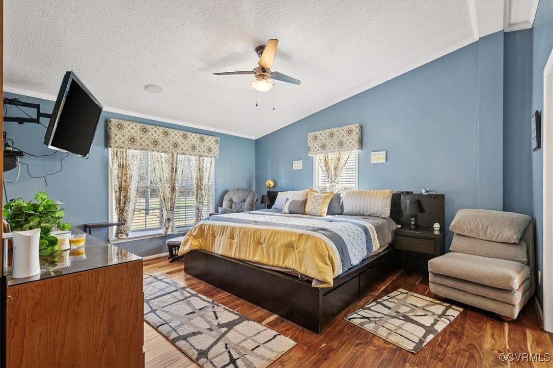 18436 Wakefield Road Courtland, VA 23837 - Photo 15 of 50 Bedroom featuring a textured ceiling, crown moldin