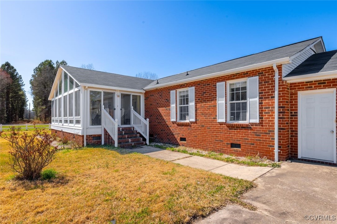 18436 Wakefield Road Courtland, VA 23837 - Photo 2 of 50 View of front of house featuring a front yard, bri