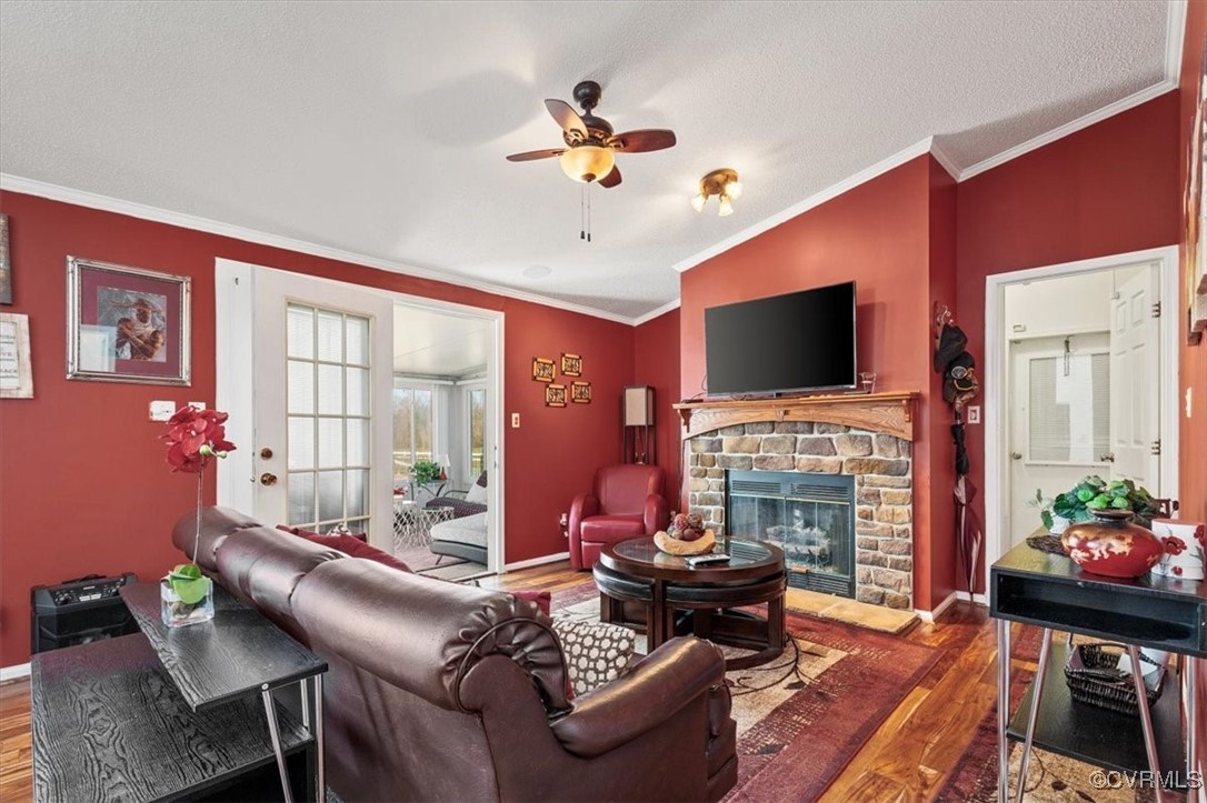 18436 Wakefield Road Courtland, VA 23837 - Photo 29 of 50 Living area featuring wood finished floors, ceilin