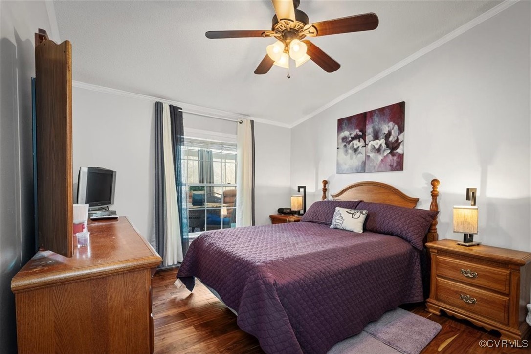 18436 Wakefield Road Courtland, VA 23837 - Photo 39 of 50 Bedroom with a ceiling fan, dark wood-style floors
