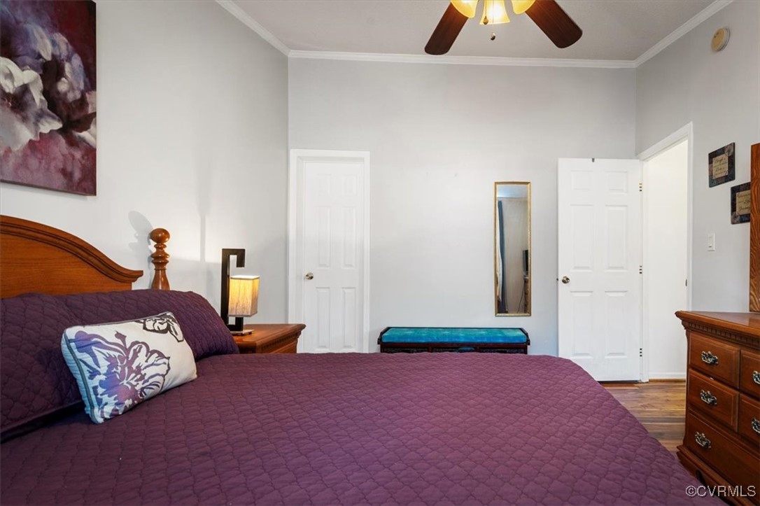 18436 Wakefield Road Courtland, VA 23837 - Photo 40 of 50 Bedroom with crown molding, wood finished floors,