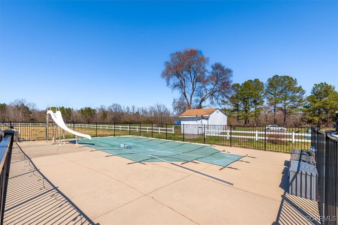 18436 Wakefield Road Courtland, VA 23837 - Photo 46 of 50 View of pool featuring a fenced in pool, a water s