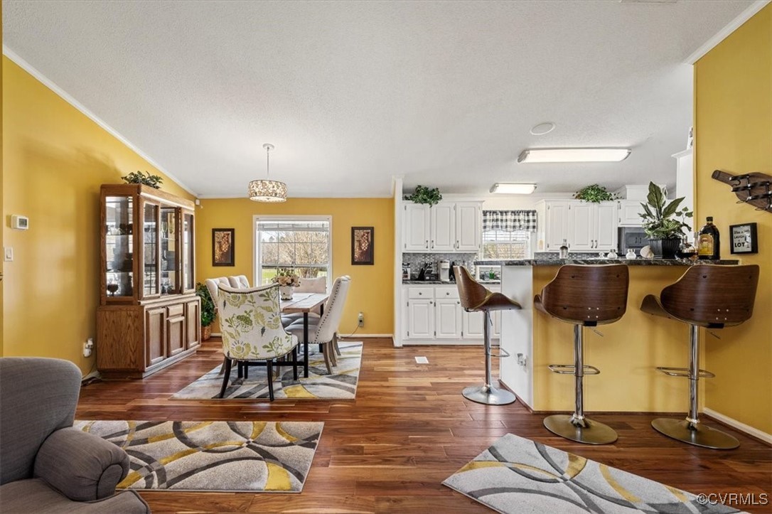 18436 Wakefield Road Courtland, VA 23837 - Photo 6 of 50 Dining room featuring baseboards, ornamental moldi