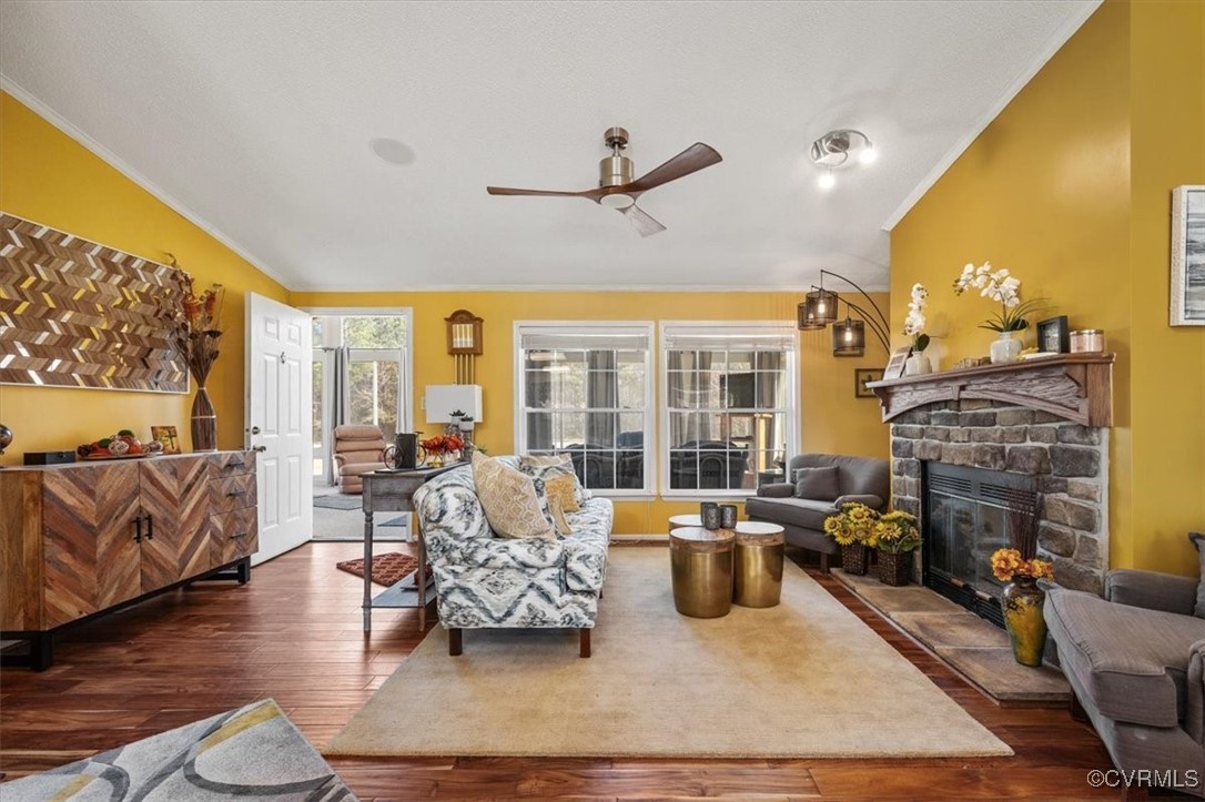 18436 Wakefield Road Courtland, VA 23837 - Photo 8 of 50 Living room with crown molding, wood finished floo