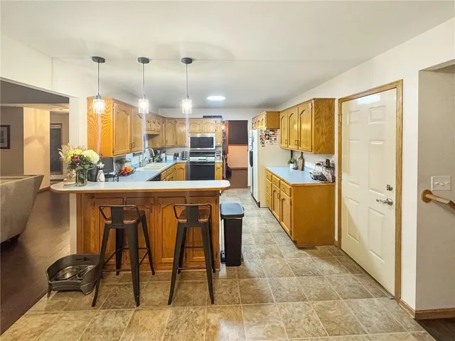 $379,000 | 875 Willow Tree Court, Higginsville, MO 64037