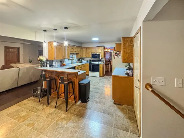 $379,000 | 875 Willow Tree Court, Higginsville, MO 64037