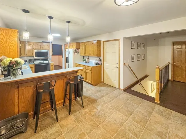 $379,000 | 875 Willow Tree Court, Higginsville, MO 64037