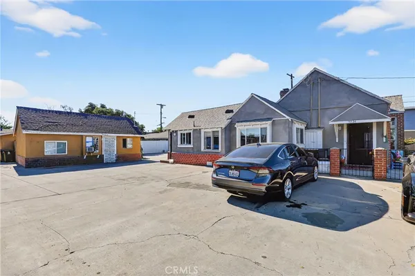 a car parked in front of a house
