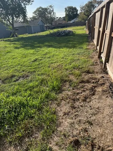 a view of a garden with an outdoor space