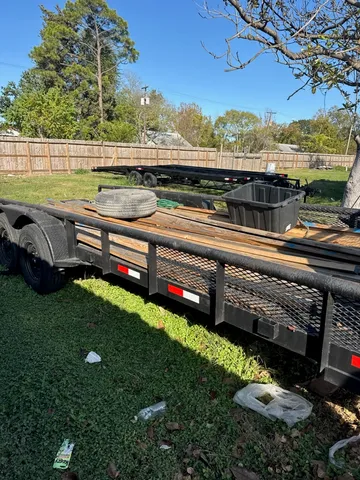 a backyard of a house with a yard and outdoor seating