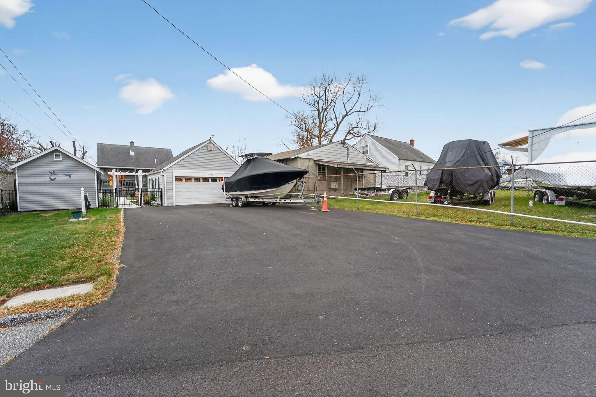 920 Seneca Park Road Middle River, MD 21220 - Photo 11 of 60 a view of a house with outdoor space and sitting area
