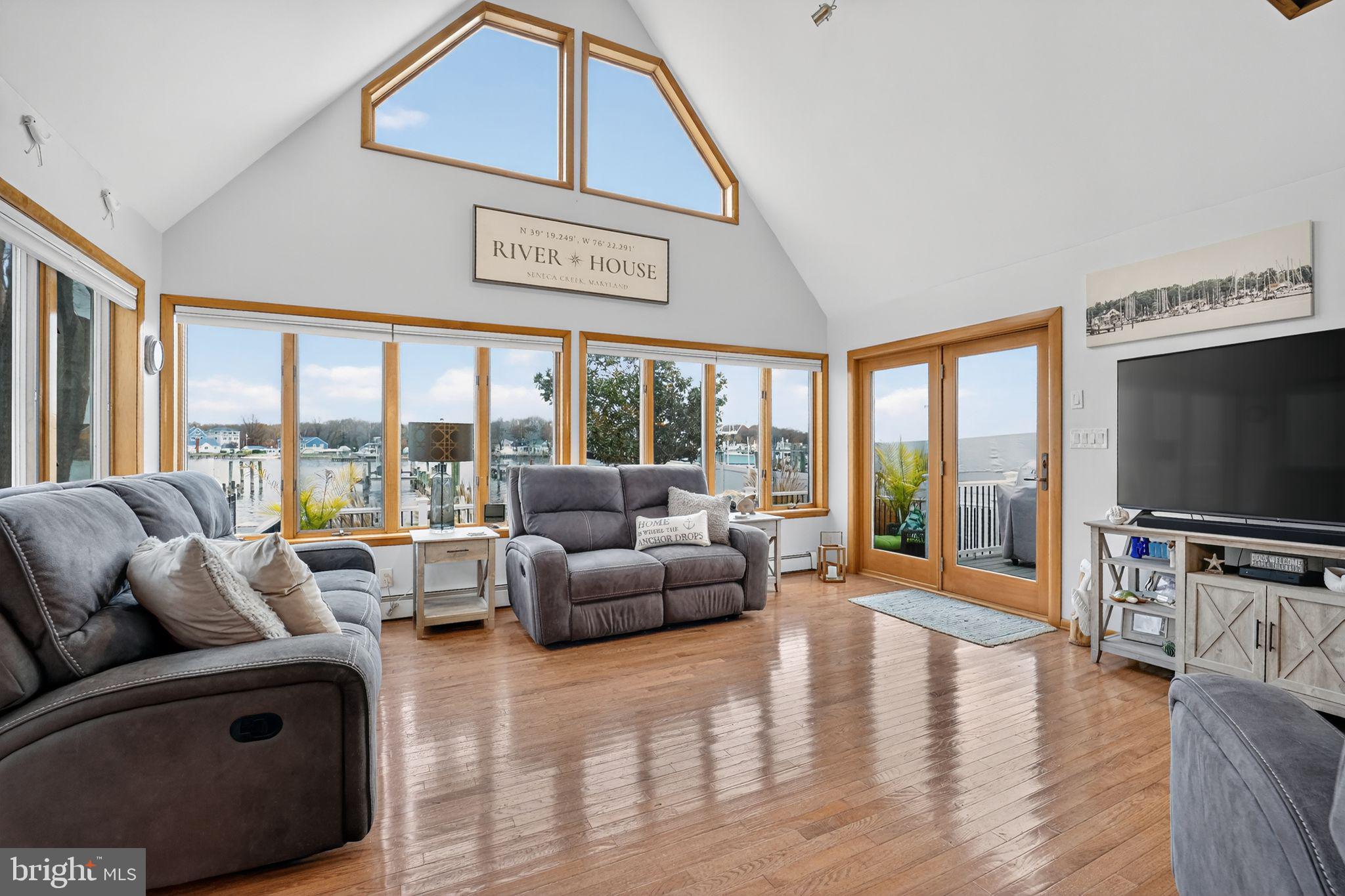 920 Seneca Park Road Middle River, MD 21220 - Photo 26 of 60 a living room with furniture and a flat screen tv