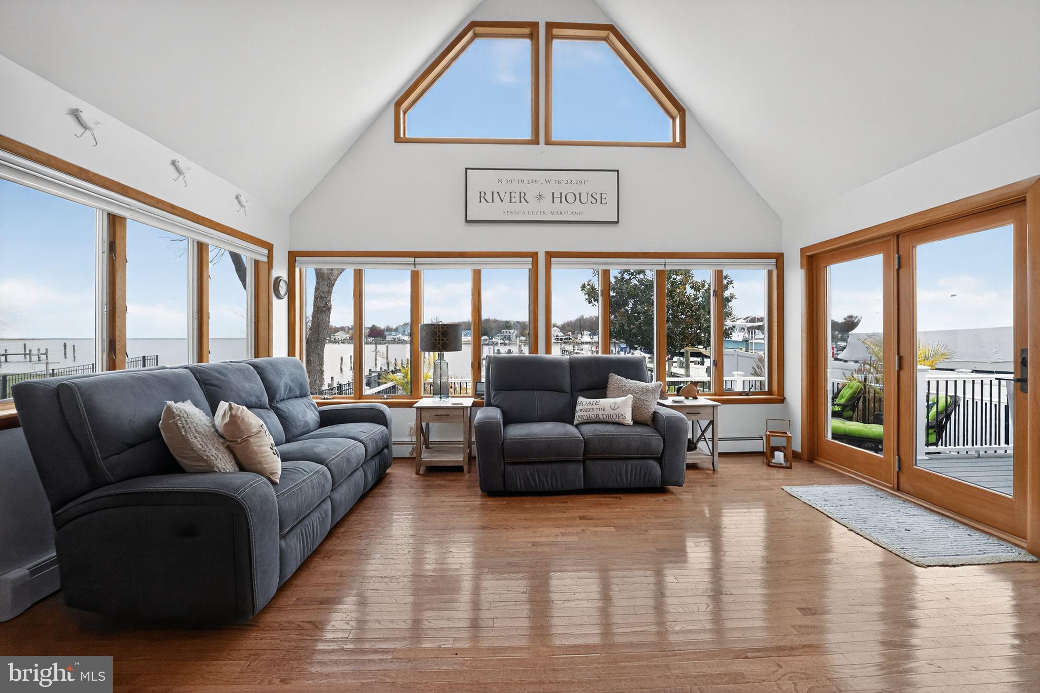 920 Seneca Park Road Middle River, MD 21220 - Photo 28 of 60 a living room with furniture and a large window