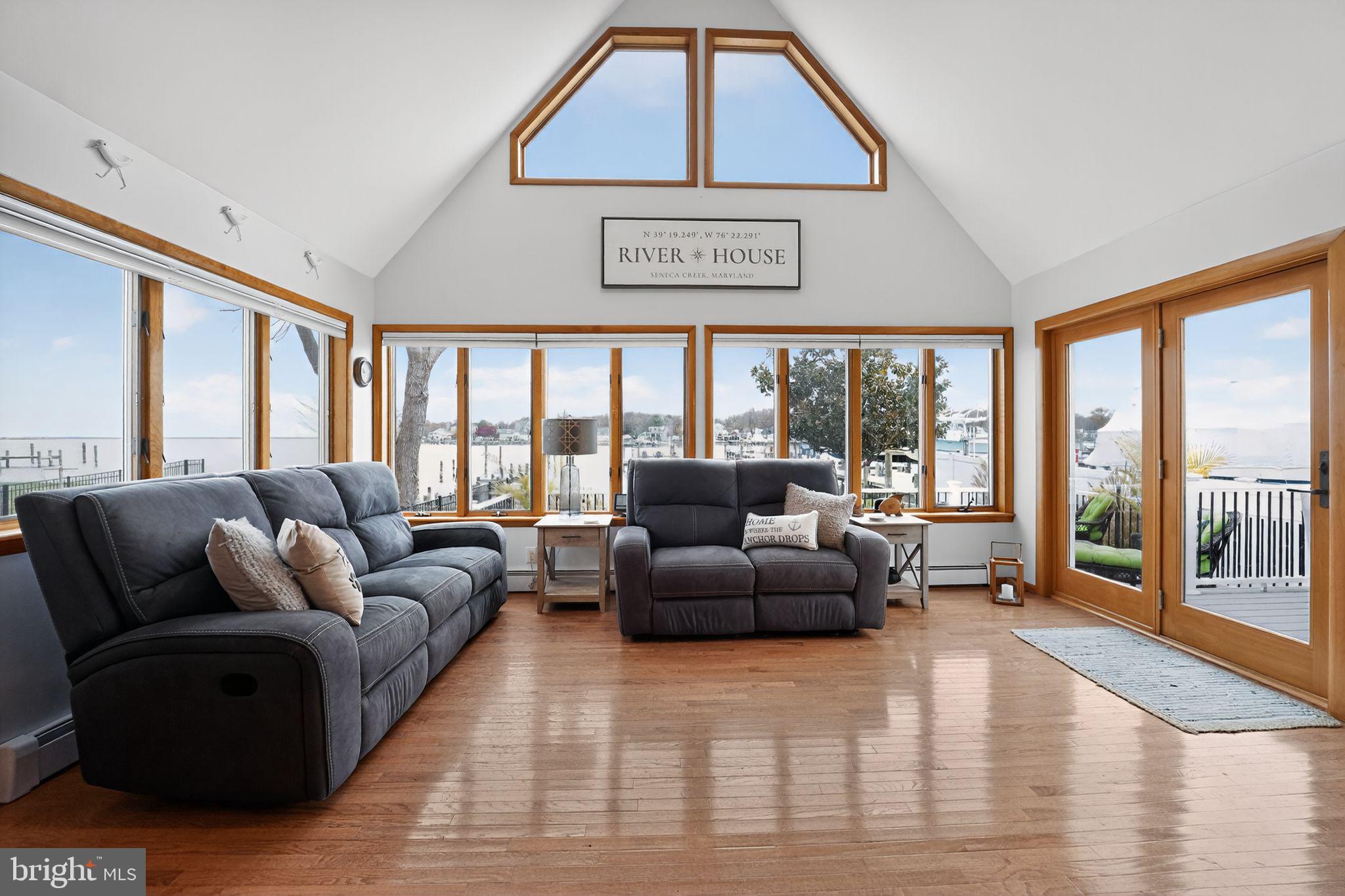 920 Seneca Park Road Middle River, MD 21220 - Photo 29 of 60 a living room with furniture and a large window