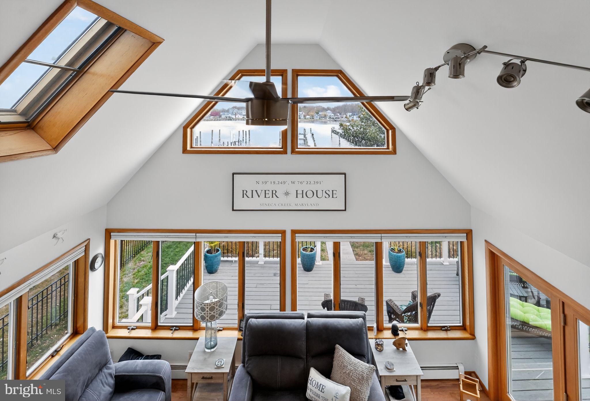 920 Seneca Park Road Middle River, MD 21220 - Photo 30 of 60 a living room with furniture and a large window