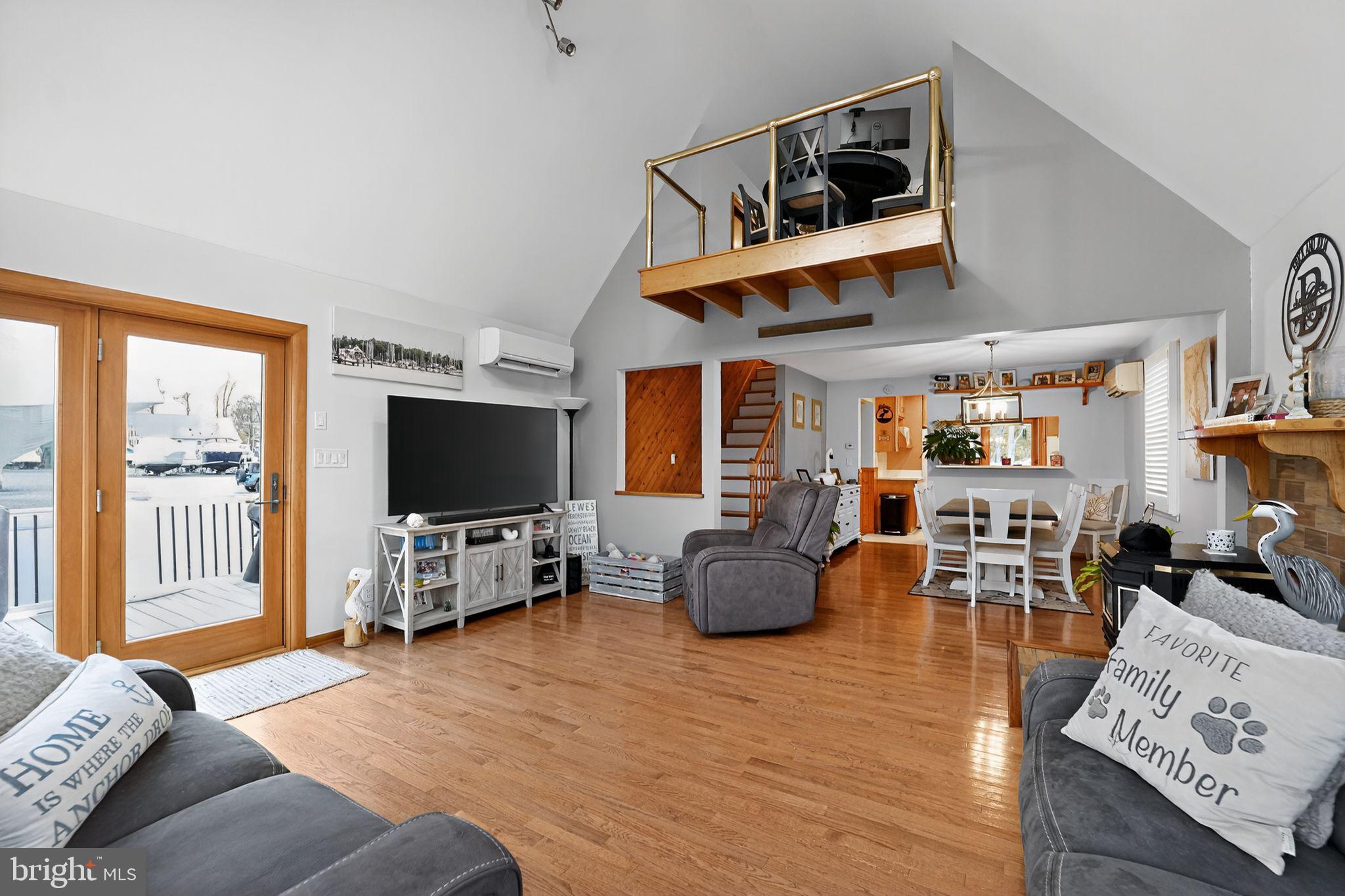 920 Seneca Park Road Middle River, MD 21220 - Photo 31 of 60 a living room with furniture and a flat screen tv