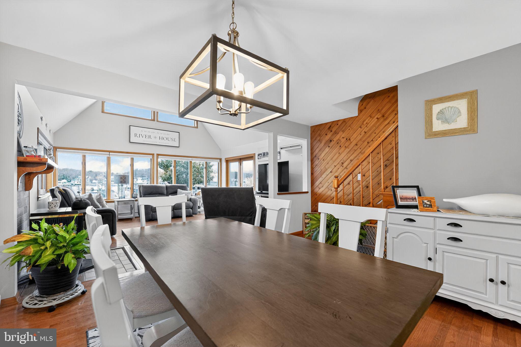 920 Seneca Park Road Middle River, MD 21220 - Photo 40 of 60 a living room with furniture kitchen view and large windows