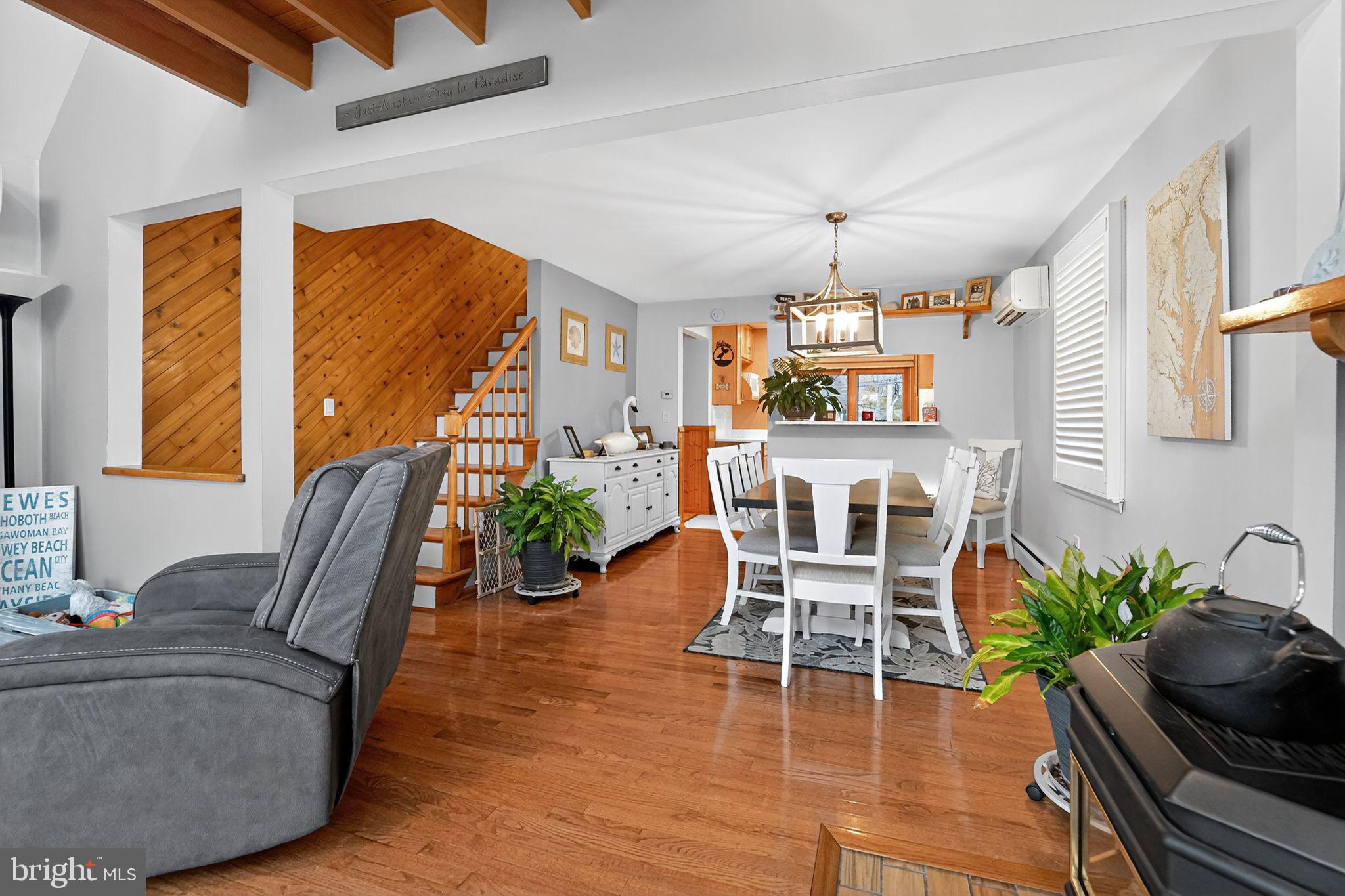 920 Seneca Park Road Middle River, MD 21220 - Photo 44 of 60 a living room with furniture fireplace and wooden floor