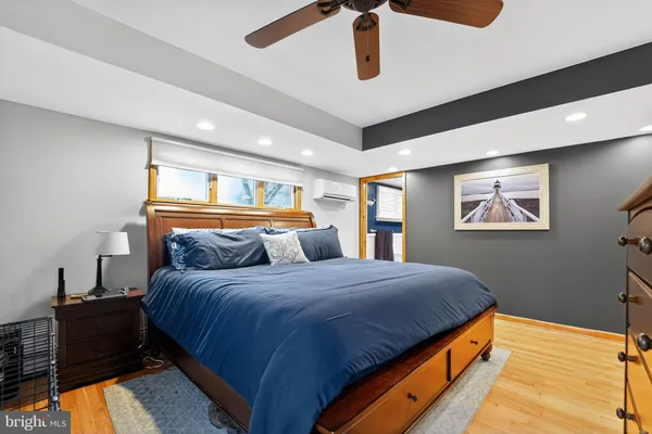 a bedroom with a bed and a cabinets