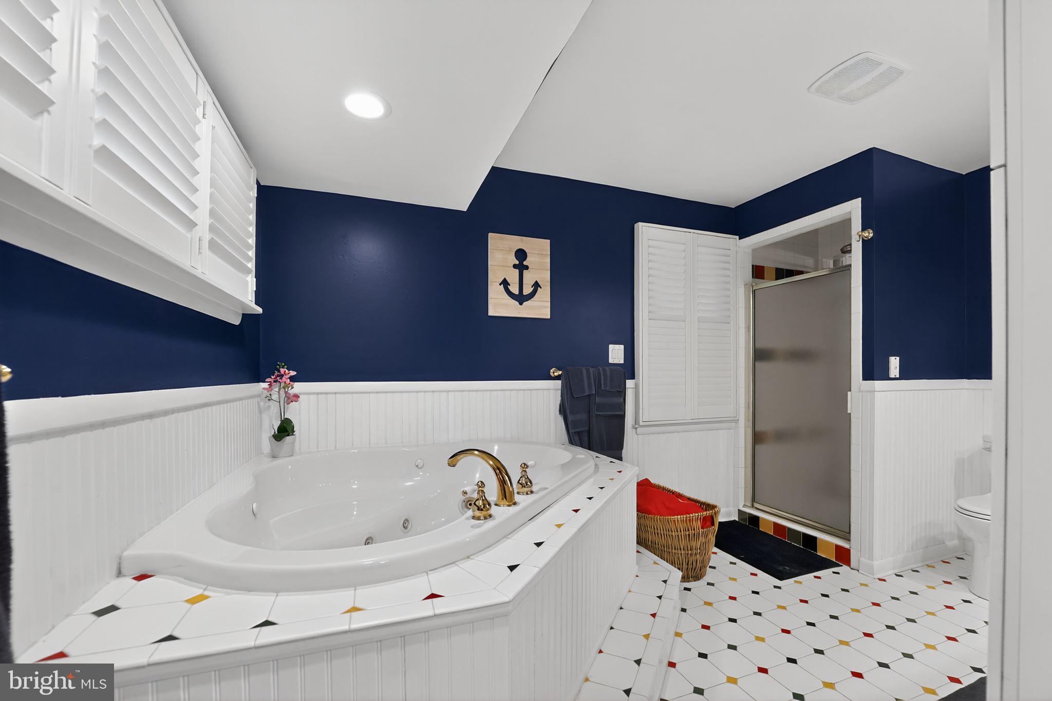 920 Seneca Park Road Middle River, MD 21220 - Photo 51 of 60 a bathroom with a bathtub and a shower