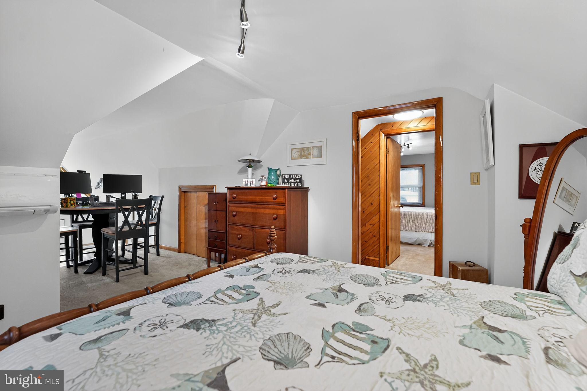 920 Seneca Park Road Middle River, MD 21220 - Photo 57 of 60 a bedroom with a bed and a dresser in it