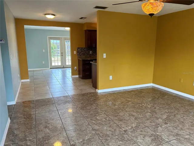 a view of an empty room and window