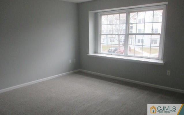 824 Edpas Road, Unit 824 New Brunswick, NJ 08901 - Photo 9 of 11 an empty room with a window