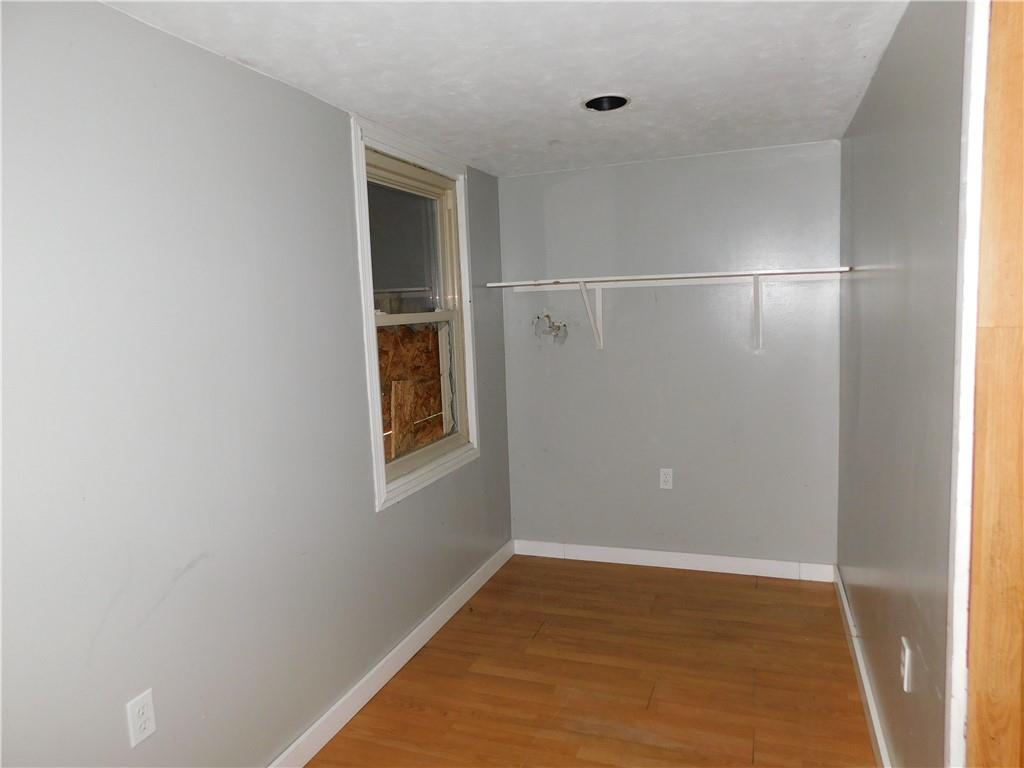 120 Clay Street Uniontown, PA 15401 - Photo 9 of 14 a view of an empty room with closet and windows