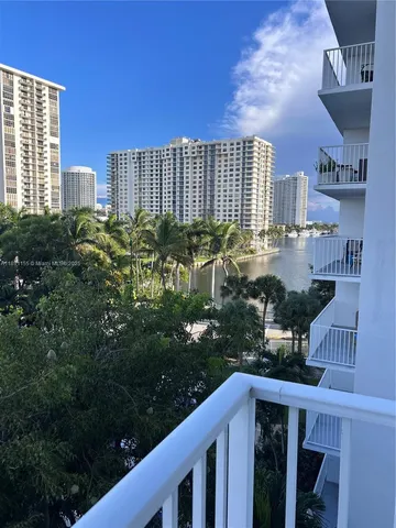 a view of a water fountain and a terrace