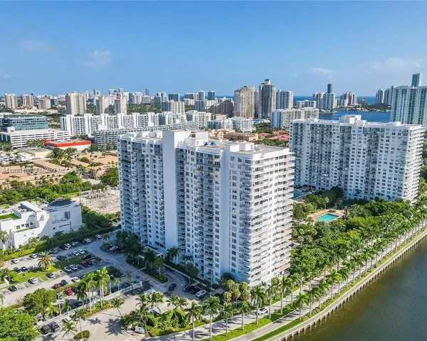 a view of a city with tall buildings