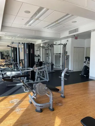 a kitchen with cabinets and white appliances