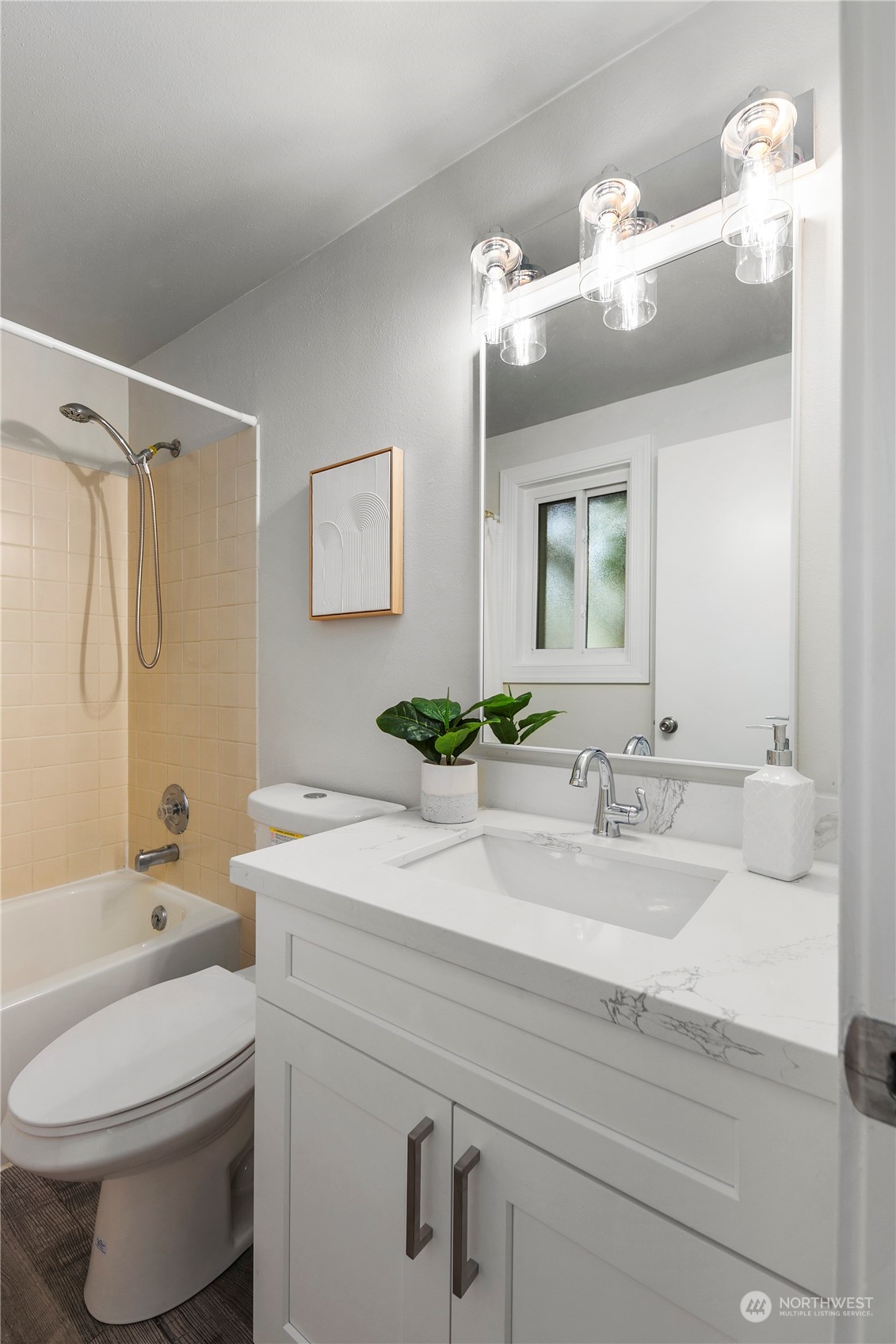 23019 20th Avenue Southeast Bothell, WA 98021 - Photo 22 of 34 a bathroom with a sink a toilet and a mirror