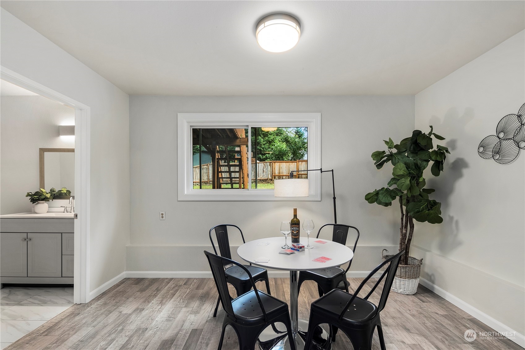 23019 20th Avenue Southeast Bothell, WA 98021 - Photo 24 of 34 a view of a dining room with furniture and window