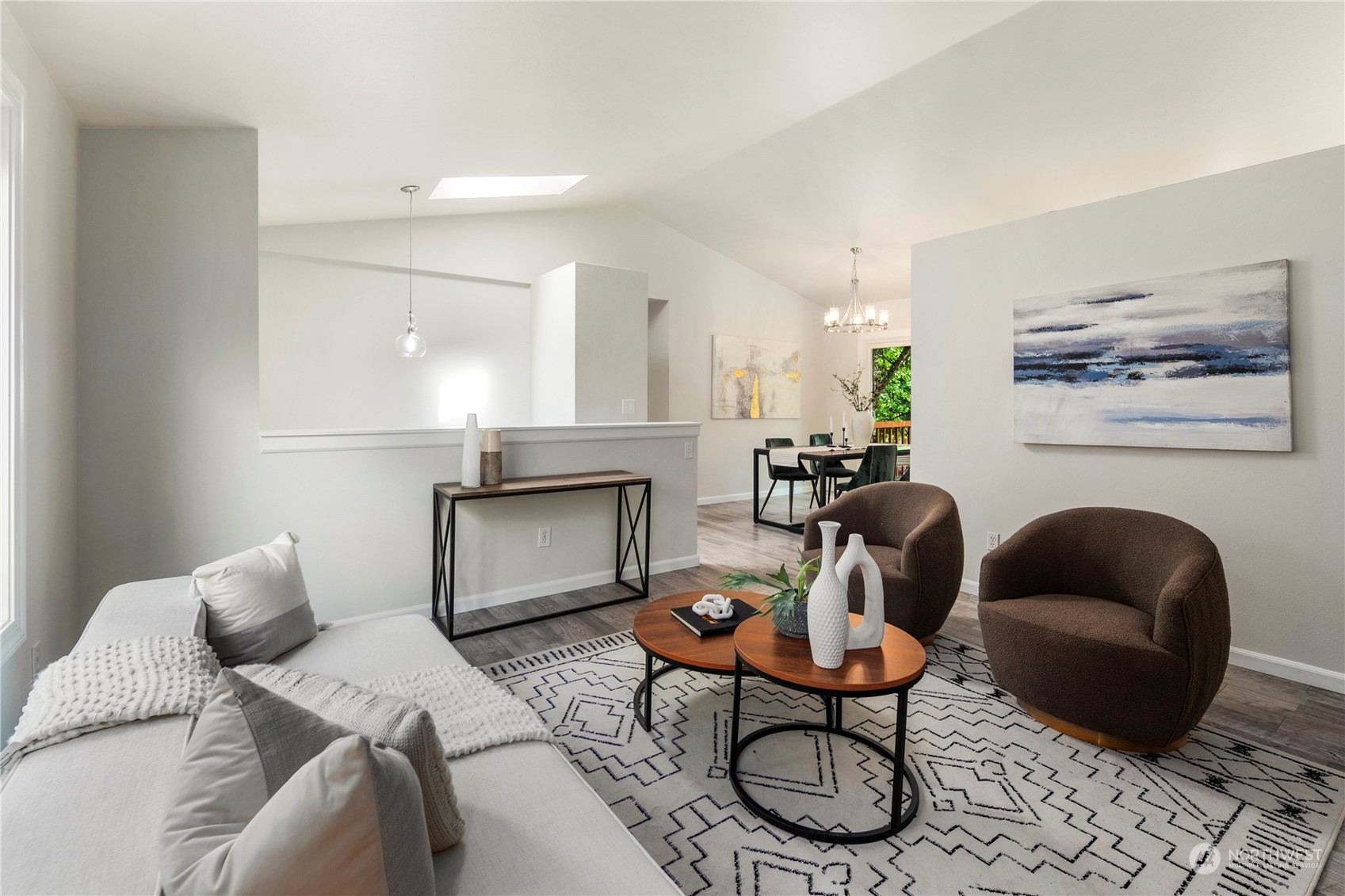 23019 20th Avenue Southeast Bothell, WA 98021 - Photo 7 of 34 a living room with furniture a rug and a fireplace