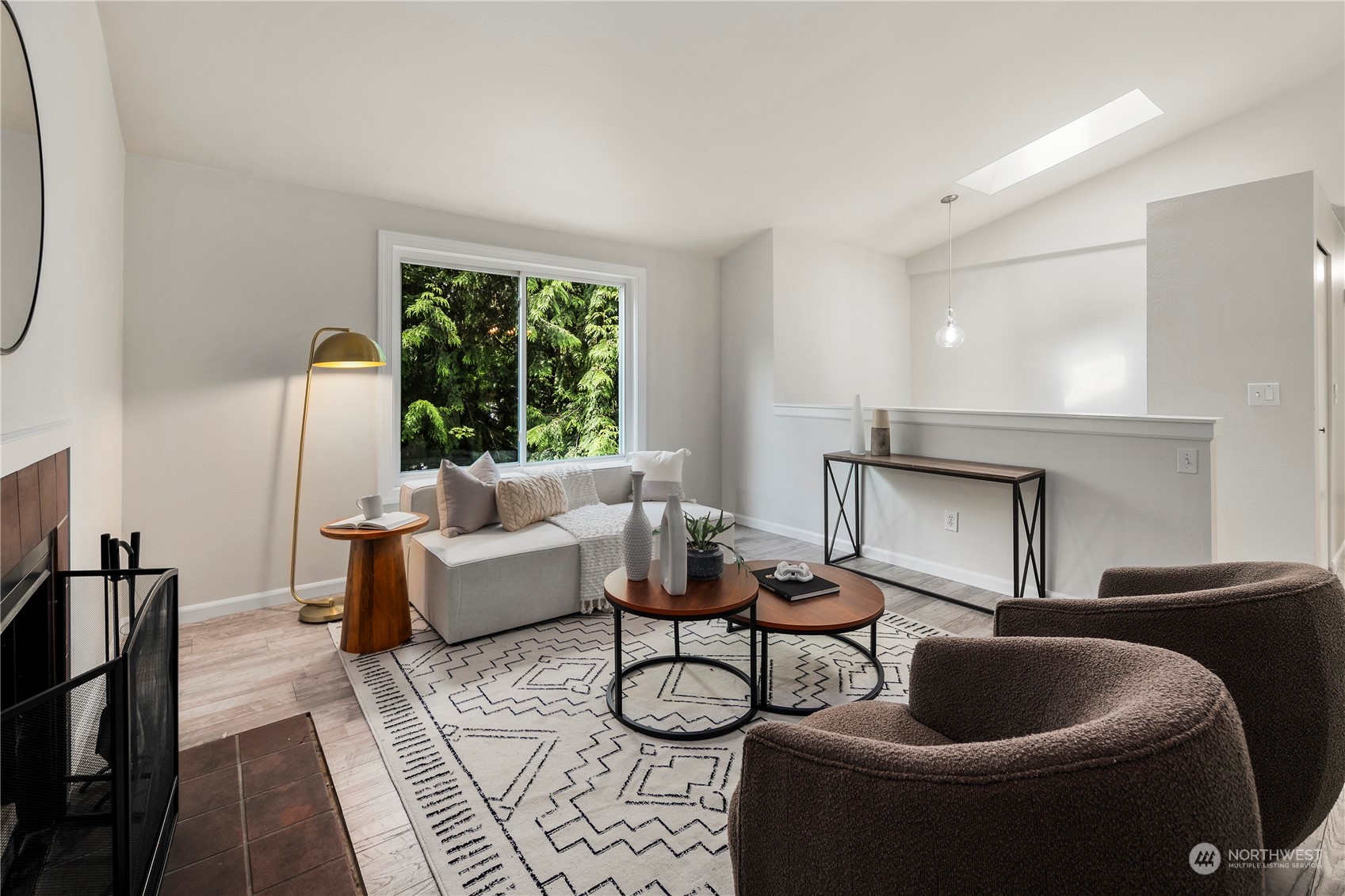 23019 20th Avenue Southeast Bothell, WA 98021 - Photo 8 of 34 a living room with furniture and a large window
