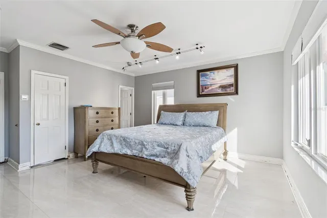a bathroom with a sink vanity and a toilet