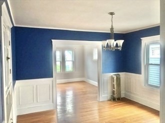 107 Wrentham Street, Unit 2 Boston, MA 02124 - Photo 8 of 11 a view of an empty room with a window
